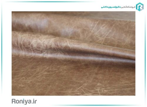 دیوار پوش ابرو بادی چرم شتری